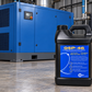 Compressor Components QSP-46 ISO VG 46 POE synthetic compressor oil 2.5 gallons in front of an unbranded rotary screw compressor, compatible alternative to Quincy QuinSyn Plus