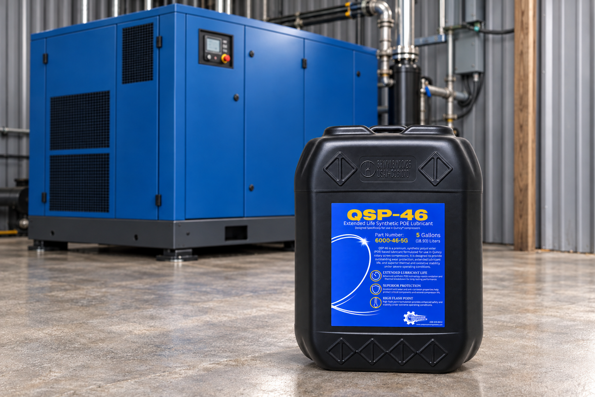 Compressor Components QSP-46 ISO VG 46 POE synthetic compressor oil 5 gallons in front of an unbranded rotary screw compressor, compatible alternative to Quincy QuinSyn Plus
